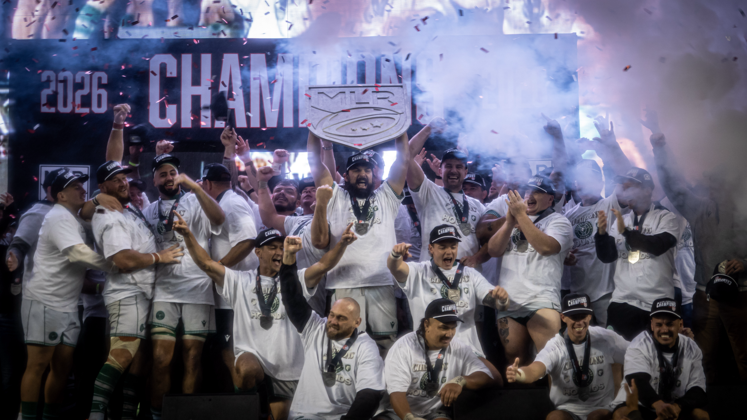 Chicago Hounds players celebrate with the MLR shield after winning the game.